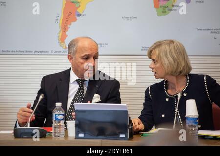 French Foreign Minister Laurent Fabius pictured alongside PS MP and former Justice minister Elisabeth Guigou (right), President of the Commission on Foreign Affairs, prior to a session of the Commission about the situation in Syria at the national assembly in Paris, France on September 18, 2013. Photo by Romain Boe/ABACAPRESS.COM Stock Photo