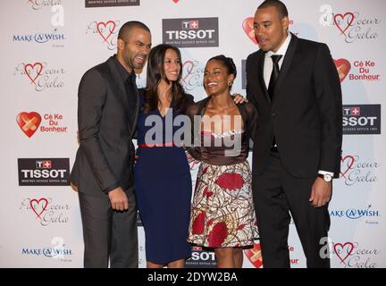 Basketball player Tony Parker poses with his girlfriend Axelle Francine and guests as he hosts his 8th charity gala 'Par Coeur' to benefit the association 'Make a Wish', at the Abbaye Paul Bocuse in Collonges-au-Mont-d'Or, near Lyon, France on September 26, 2013. Photo by Vincent Dargent/ABACAPRESS.COM Stock Photo