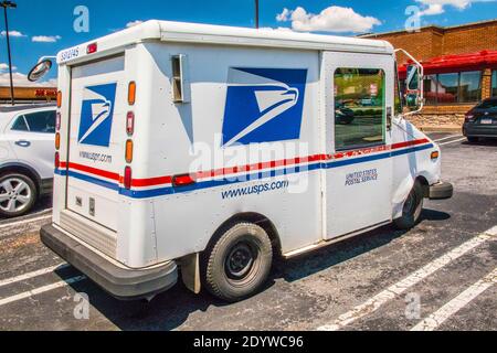 Gwinnett, County USA - 05 31 20: USPS mail delivery truck back corner view Stock Photo