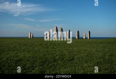Standing stone granite sculptures art installation menhir park in A Coruna Galicia in Spain Stock Photo