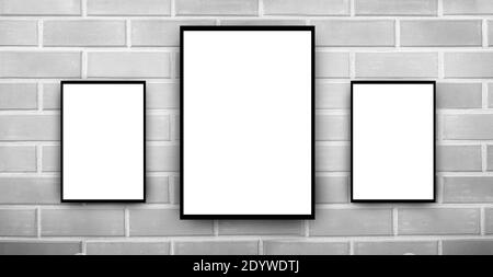 black and White frames on brick wall Stock Photo