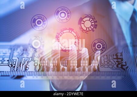 Businessman holding graphic network on PCB circuit background Technology communication concept Stock Photo