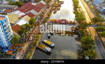 Aerial view of Ben Binh Dong (Binh Dong harbour) in lunar new year ( Tet Festical in Vietnam) with flower boats along side the river. Holiday and land Stock Photo