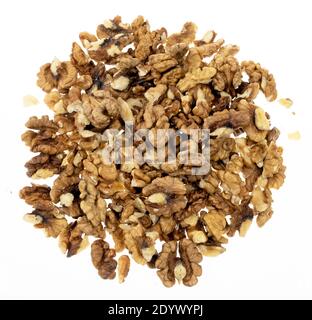 Peeled walnut kernels on a white background. Top view Stock Photo