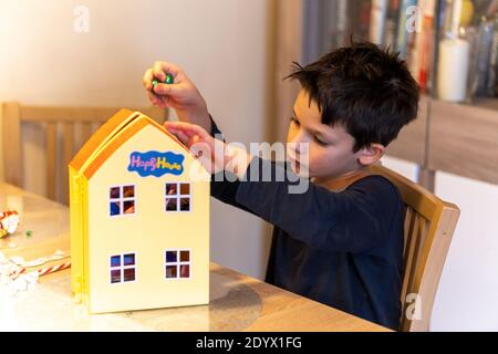 Plastic Peppa Pig toy house with different figurines Stock Photo