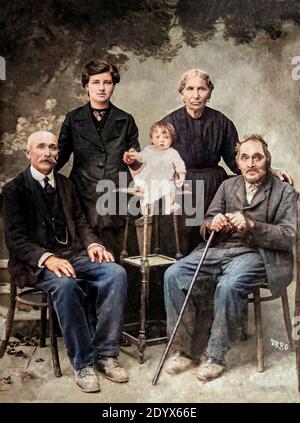 ROVIGO, ITALY MARCH 1919: Family portrait from the early 1900s, digitally colourized image Stock Photo