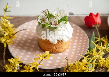 Spring composition with Easter cake on a beautiful plate close up. Stock Photo