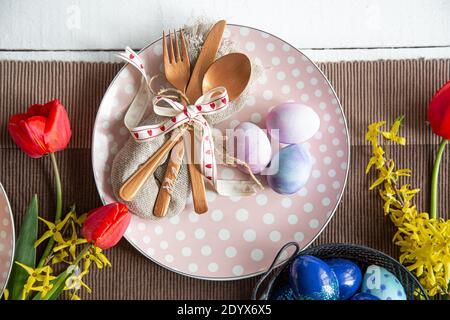 Close up idea for setting a festive table for the Easter holiday. Stock Photo