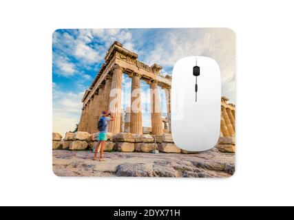 White wireless computer mouse on mat with print Stock Photo