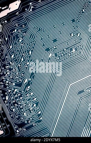 Blue electronic mother board circuit close up macro background. Stock Photo