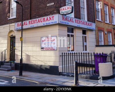 The Halal Restaurant opened in 1939, is the oldest Indian restaurant in the East End, on the corner of Allie Street and St Mark's Place in Aldgate Stock Photo