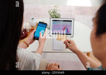 Couple making purchases online Stock Photo