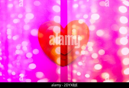 creative background with one paper heart origami, Valentine greeting card or Happy Valentine's Day with lights, love concept. Handcrafted designed car Stock Photo