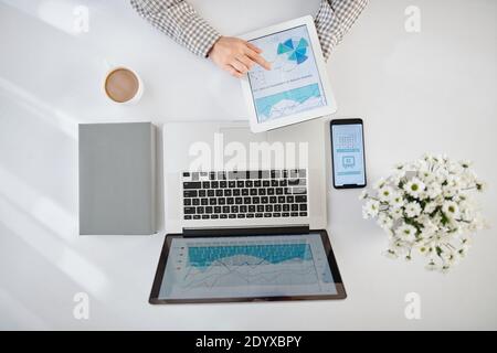 Businesswoman analyzing statistics Stock Photo