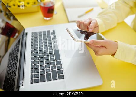 Entrepreneur checking text messages Stock Photo