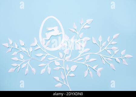 Easter blue background with paper bunny and flowers Stock Photo