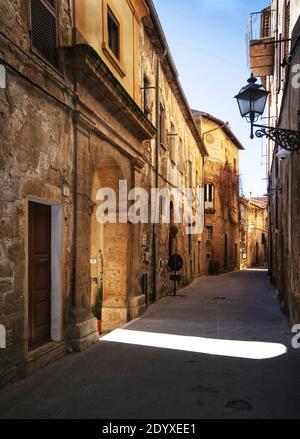 typical alley view of the antique Pitigliano town, in Tuscany region Stock Photo