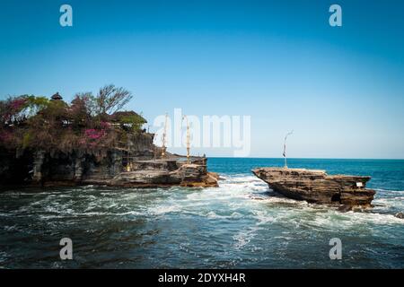 Close-up image of Tanah Lot Temple in the wavy sea Stock Photo