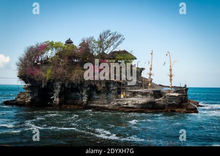A close up image of the Tanah Lot Temple in the wavy ocean Stock Photo