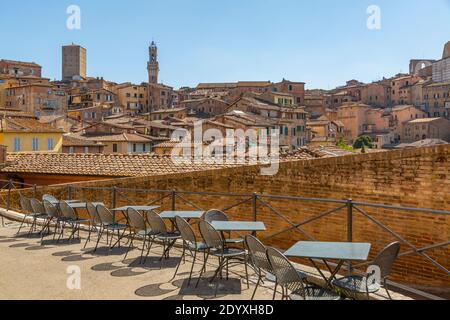 View of city skyline including Campanile of Palazzo Comunale, Siena, Tuscany, Italy, Europe