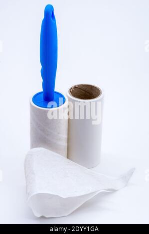 roller for cleaning clothes from wool, pet hair on clothes, Roller cleans clothes Stock Photo