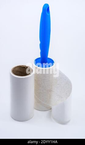 roller for cleaning clothes from wool, pet hair on clothes, Roller cleans clothes Stock Photo