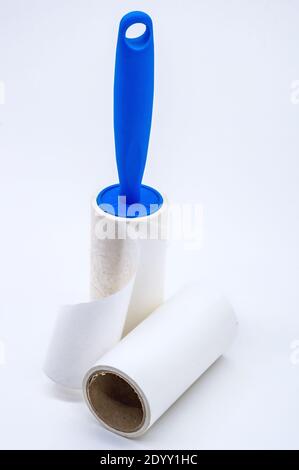 roller for cleaning clothes from wool, pet hair on clothes, Roller cleans clothes Stock Photo