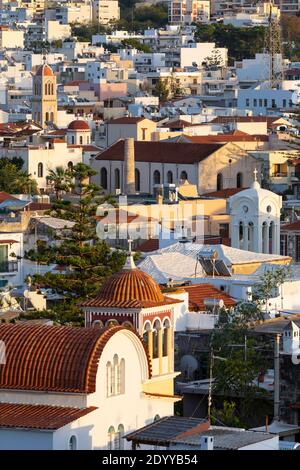 Cityscape view of Rethymno as seen from Fortezza Castle, showing churches, Crete, Greece Stock Photo