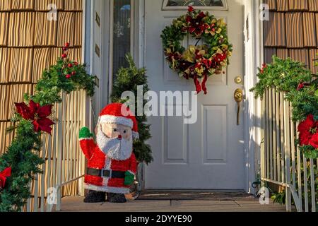 Christmas Decorations on Front Porch of an Urban Townhouse Stock Photo