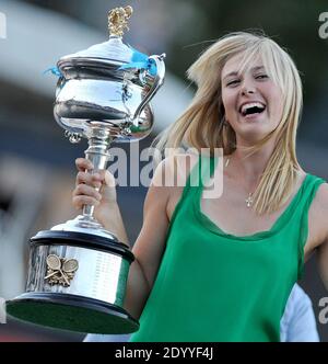 Beijing, Australia. 26th Jan, 2008. Russia's Maria Sharapova poses with the women's single trophy after winning the championship at the Australian Open Tennis Tournament in Melbourne, Australia, Jan. 26, 2008. Five-time Grand Slam winner Maria Sharapova of Russia announced her retirement from professional tennis at 32 on February 26, followed by NBA star Vince Carter (June 25), Chinese badminton icon Lin Dan (July 4), and Spanish goalkeeper Iker Casillas (August 4). Credit: Lui Sui Wai/Xinhua/Alamy Live News Stock Photo