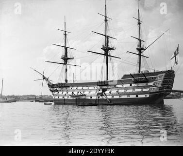 A late Victorian black and white photograph showing HMS Victory, Nelson's Flagship from the Battle Of Trafalgar, still afloat in Portsmouth, England. Stock Photo