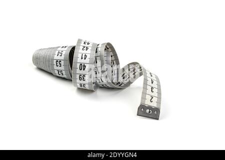 A flexible folded centimeter is isolated on a white background. Stock Photo
