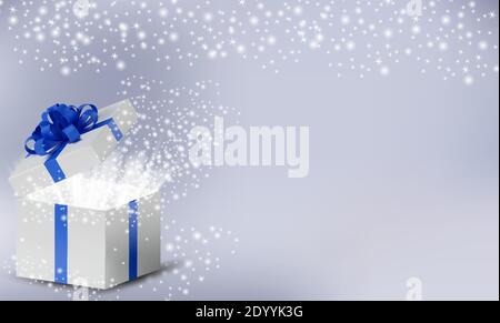 White box in a blue ribbon and bow on top. Opened Holiday box with glowing glitter sparkles and magic light inside. Celebration decoration objects, New Year and Christmas design. Vector illustration Stock Vector