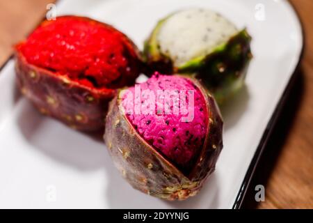 Colorful pitayas mexican exotic fruit macro pink red and white natural healthy Stock Photo
