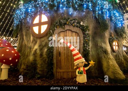 Magic gnome house in a tree trunk. Stock Photo
