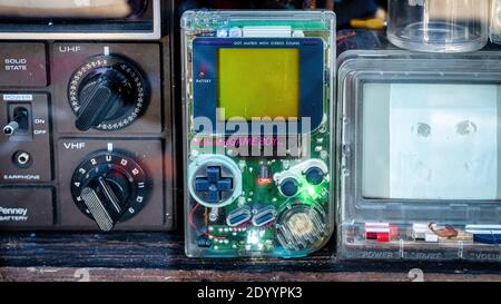 Nintendo handheld video game device Game boy in a shop window display with transparent cover Stock Photo