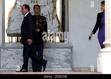 President Francois Hollande and Junior Minister for Women's Rights and Government Spokesperson Najat Vallaud-Belkacem leave the Elysee presidential Palace after the weekly cabinet meeting, in Paris, France, on october 02, 2013. Photo by Stephane Lemouton/ABACAPRESS.COM Stock Photo