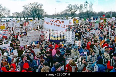 Washington, DC. USA, January 22, 1985 Thousands of attendees fron all over the United States gather on the Washington Monument grounds with their signs and banners during the Annual Right To Life March Stock Photo