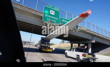 Fort Worth,Texas - Dec. 2020 -  120 foot Wind Turbine Blade on its way to West Texas on a 18 wheeler transport. Texas is now the leader in America for Stock Photo