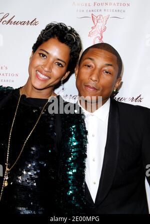 Pharrell Williams attending the Off-White Womenswear Fall/Winter 2022-2023  show Spaceship Earth: An Imaginary Experience at Palais Brongniart during  Paris Fashion Week in Paris, France on February 28, 2022. Photo by Aurore  Marechal/ABACAPRESS.COM