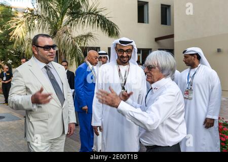 Morocco's King Mohammed VI (2nd from L) seen with Bernie Ecclestone (1st from R) and Abu Dhabi's Crown Prince Sheikh Mohammed Bin Zayed Al Nahyan (2nd from R) at Yas Marina Circuit, near Abu Dhabi, United Arab Emirates, on November 3rd, 2013, during 5th Abu Dhabi Formula One Grand Prix. Photo by Ammar Abd Rabbo/ABACAPRESS.COM Stock Photo