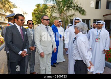 Morocco's King Mohammed VI (2nd from L) seen with Bernie Ecclestone (2nd from R) at Yas Marina Circuit, near Abu Dhabi, United Arab Emirates, on November 3rd, 2013, during 5th Abu Dhabi Formula One Grand Prix. Photo by Ammar Abd Rabbo/ABACAPRESS.COM Stock Photo