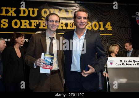 Herve Jourdain and Jean Dujardin attending a ceremony awarding the 67th Quai des Orfevres literary Price in Paris, France on November 12, 2013. Photo by Nicolas Briquet/ABACAPRESS.COM Stock Photo