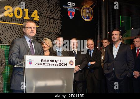 Paris Judiciary Police Director Christian Flaesch and Jean Dujardin attending a ceremony awarding the 67th Quai des Orfevres literary Price in Paris, France on November 12, 2013. Photo by Nicolas Briquet/ABACAPRESS.COM Stock Photo