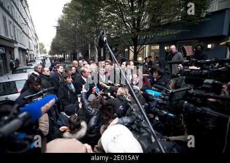 Interior Minister Manual Valls, Culture Minister Aurelie Filippetti, Paris Mayor Bertrand Delanoe, Deputy Mayor Anne Hidalgo and Liberation chairman Nicolas Demorand answer the media outside the newspaper's headquarters after a gunman opened fire injuring a young photographer, in Paris, France on November 18, 2013. Photo by Nicolas Messyasz/ABACAPRESS.COM Stock Photo