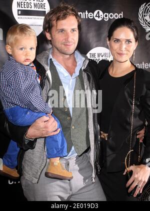 Actor Josh Lucas with his wife Jessica Henriquez and their son Noah attend the premiere of David Guetta's new music video 'One Voice' onto the front of United Nations headquarters in New York City, NY, USA, on November 22, 2013. Photo by Charles Guerin/ABACAPRESS.COM. Stock Photo