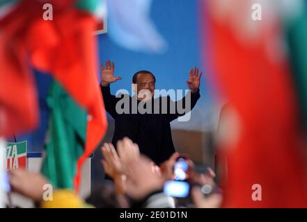 Italy's former Prime Minister Silvio Berlusconi delivers a speech to supporters outside his private residence, the Palazzo Grazioli, on November 27, 2013 in Rome, Italy just after the Italian Senate voted to expel him from parliament after his conviction for tax fraud. Photo by Eric Vandeville/ABACAPRESS.COM Stock Photo