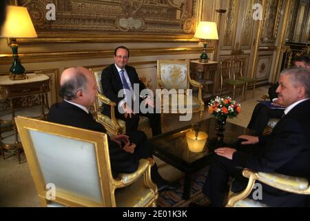 French President Francois Hollande and Algerian Prime Minister Abdelmalek Sellal prior to a meeting at the Elysee Palace in Paris, France on December 5, 2013. Photo by Rafael Yaghobzadeh/Pool/ABACAPRESS.COM Stock Photo