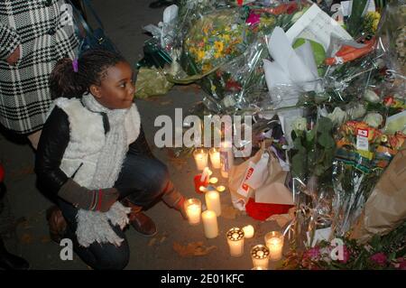 French people pay tribute to Nelson Mandela in front of South African embassy in Paris, France on December 6, 2013. Photo by Alain Apaydin/ABACAPRESS.COM Stock Photo