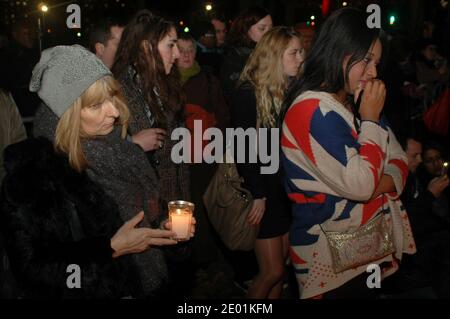 French people pay tribute to Nelson Mandela in front of South African embassy in Paris, France on December 6, 2013. Photo by Alain Apaydin/ABACAPRESS.COM Stock Photo